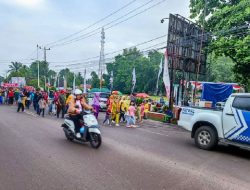Polres Muara Enim Lakukan Pengawalan dan Pengamanan Jalan Sehat Sosialisasi Pilkada 2024