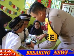 Polres Muara Enim Dukung Kesehatan Anak Melalui Program Pemberian Makanan Bergizi di SD Negeri 08 Muara Enim