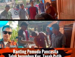 Ranting Pemuda Pancasila Teluk Berembun Wujudkan Kebersamaan melalui Pengecatan Kantor