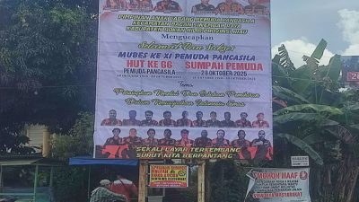 PAC Pemuda Pancasila Bagan Sinembah Raya Pasang Baliho Peringati HUT ke-66 dan Sumpah Pemuda