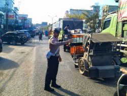 Polsek Bagan Sinembah Gelar Strong Point Pagi, Jaga Kamseltibcarlantas di Jalan Jenderal Sudirman