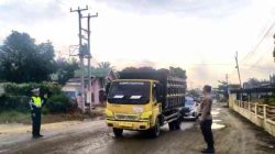 Ciptakan Lalu Lintas Aman dan Tertib Polsek Pujud Gelar Strong Point Pagi