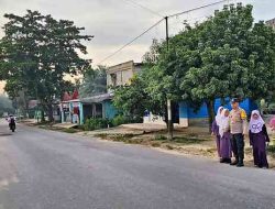 Polsek Pujud Gelar Strong Point Pagi, Lalu Lintas Terpantau Ramai Lancar