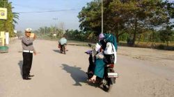 Polsek Pujud Gelar Strong Point Pagi, Lalu Lintas Terpantau Ramai Lancar